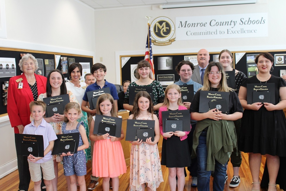 Picture of our Young Georgia Authors Winners with the BOE