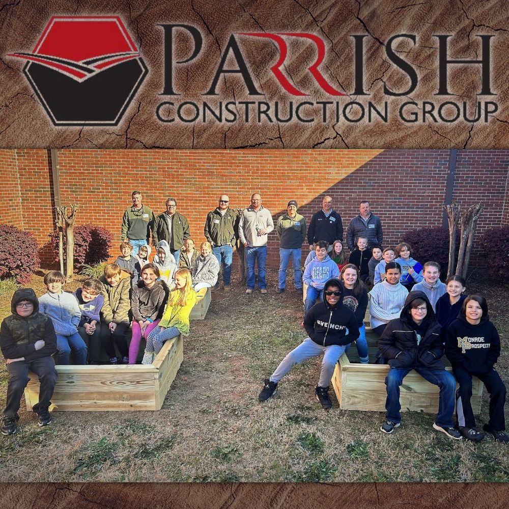 pic of Parrish Construction Group employees & 5th grade project soar studnents