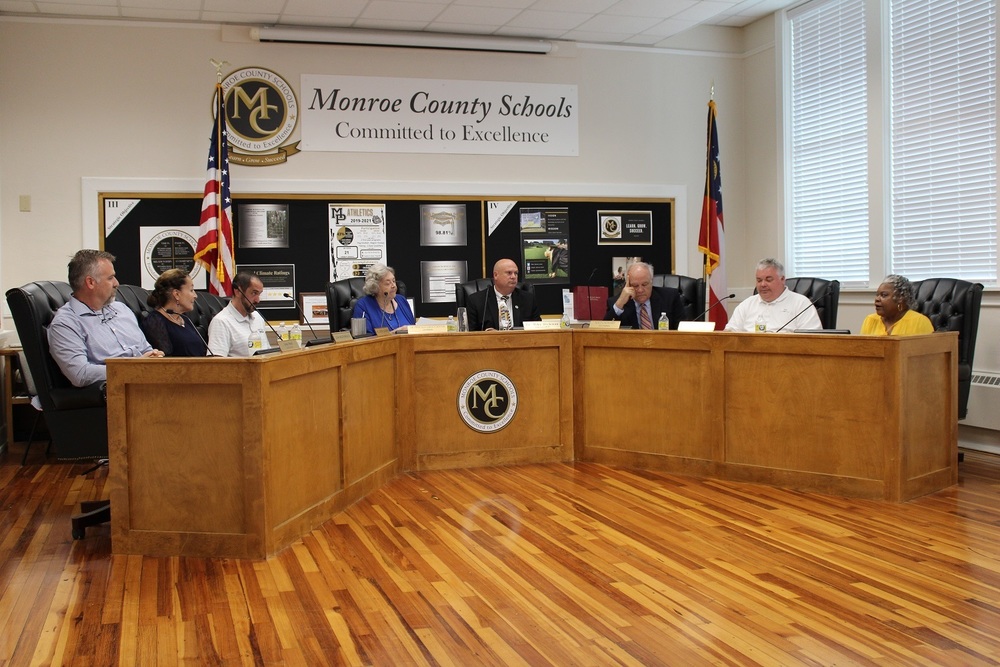 Picture of the Monroe County School Board in the Board Room
